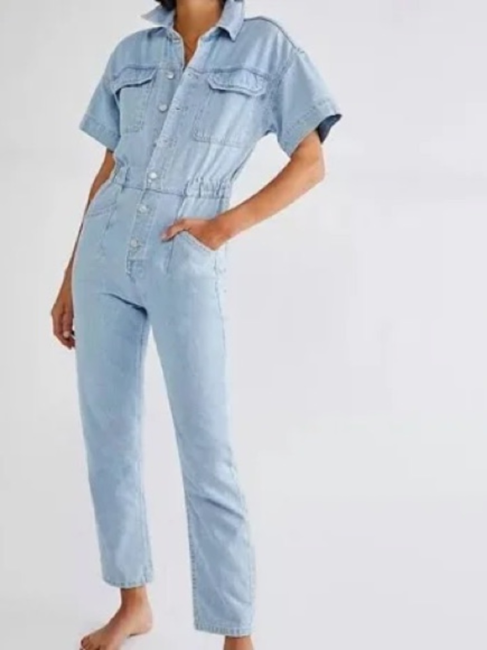 Free People We The Free Marci Denim Jumpsuit in‎ a light wash blue